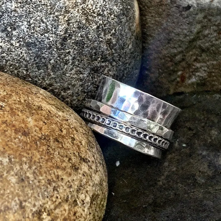 Sterling silver, textured, spinner ring. UK size S