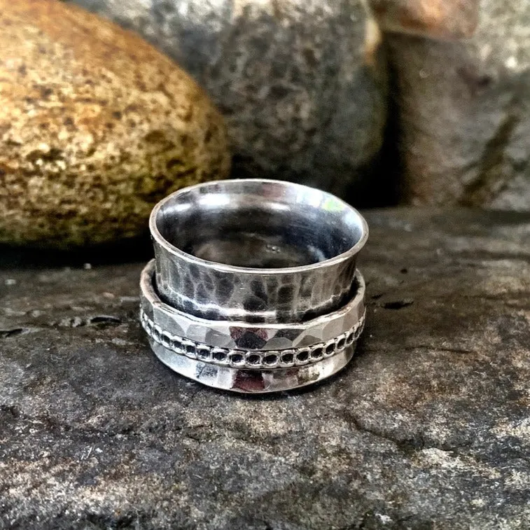 Sterling silver, textured, spinner ring. UK size S