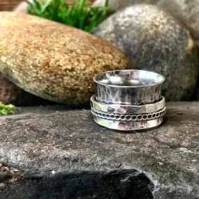 Sterling silver, textured, spinner ring. UK size S